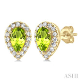 5x3 MM Pear Shape Peridot and 1/8 ctw Single Cut Diamond Halo Semi Precious Stud Earrings in 10K Yellow Gold